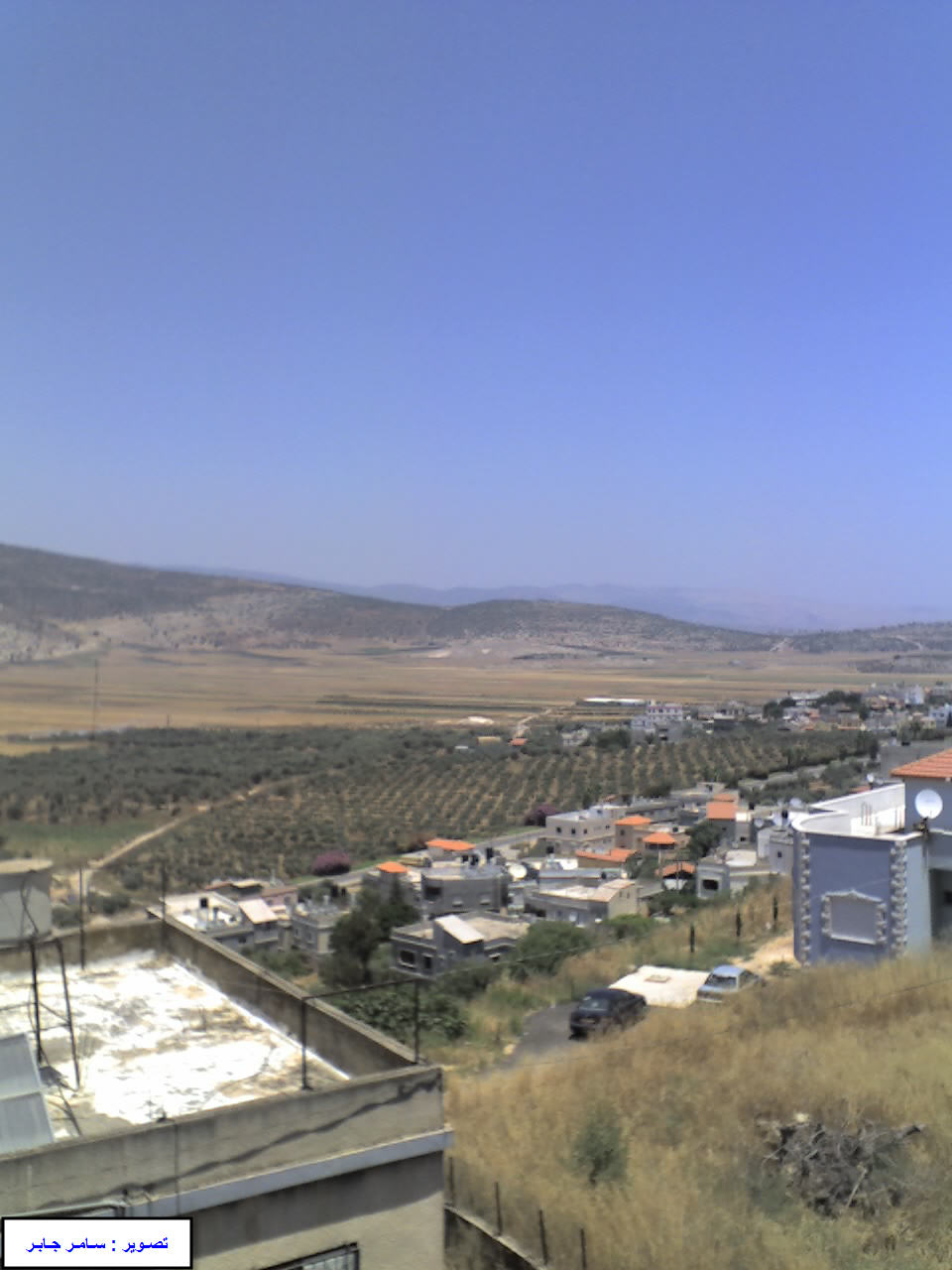 صورة لقرية البعينه - فلسطين: : منظر من شرفة أحد المنازل , يطل على سهل البطوف , 2007
