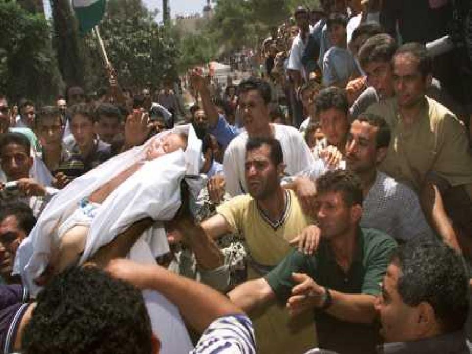 صورة لمدينة إذنا - فلسطين: : الشهيد الطفل ضياء اطميزة احد شهداء المجزرة الصهيونية على مدخل البلدة