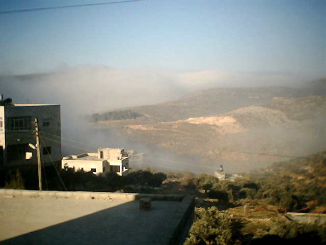 صورة لقرية رمون - فلسطين: : عناق السحاب 2 / جبال رمون الغربيه 13-12-2007